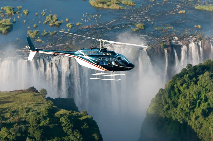 Helicopter flying over Victoria Falls