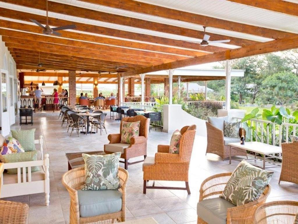 Open-air lodge veranda with seating